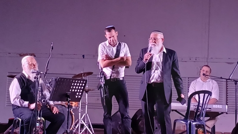 מוצש לךלך מלווה מלכה מוסא ברלין והרב אייל יעקובוביץ.jpg